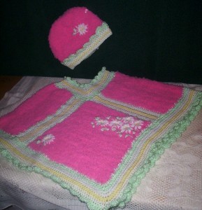 Pink poncho and bonnet set Pink poncho and bonnet set