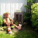 Garden guardian made from old clay pots Garden guardian made from old clay pots