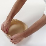 The prefect pastry Carefully folding edges of the pie crust