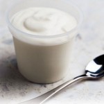 yogurt-in-a-tub-with-spoonashx yogurt-in-a-tub-with-spoonashx